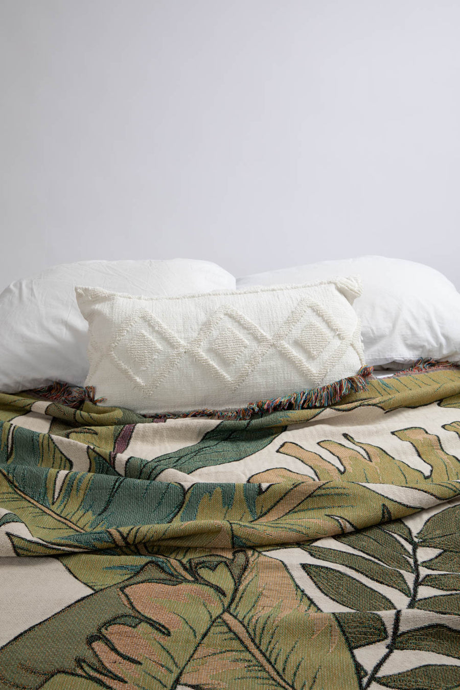 Palm Leaf Throw Blanket On Bed