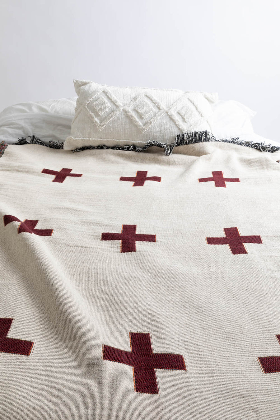 Swiss Plus Throw Blanket On Bed