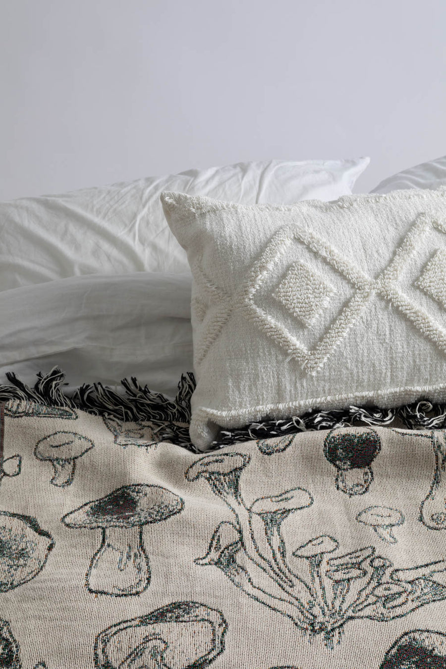 Mushroom Black and White Throw Blanket On Bed