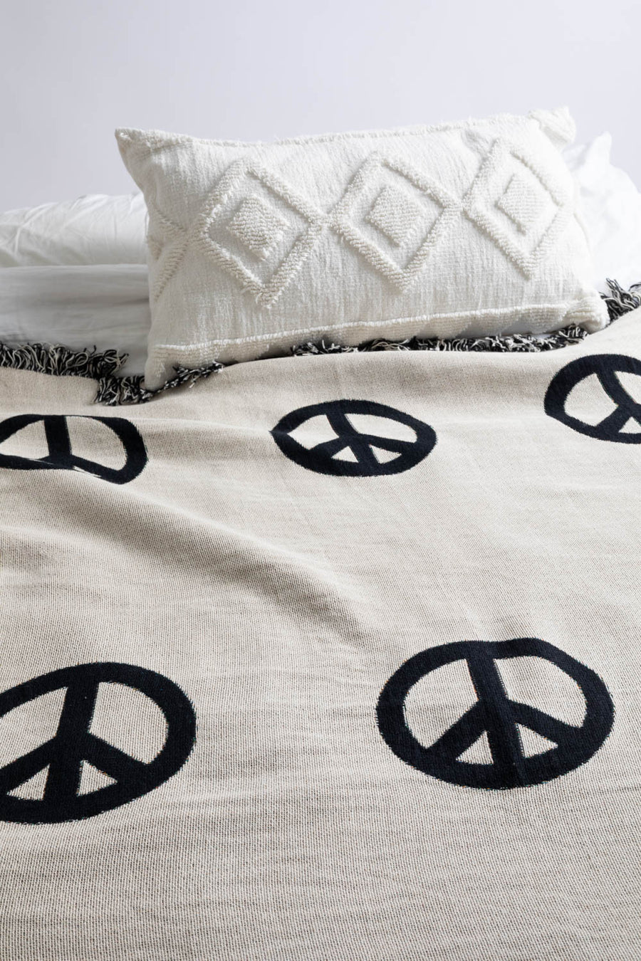 Peace Sign Throw Blanket On Bed